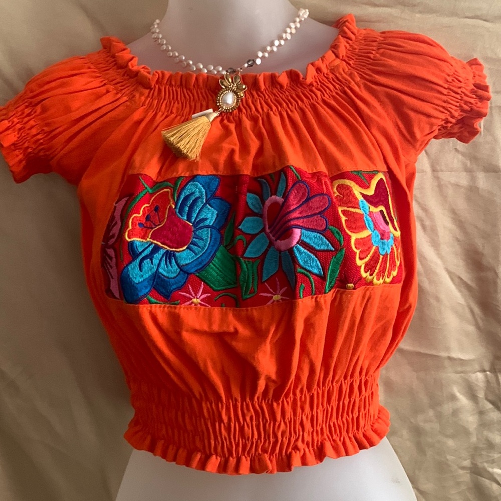 Small orange blouse